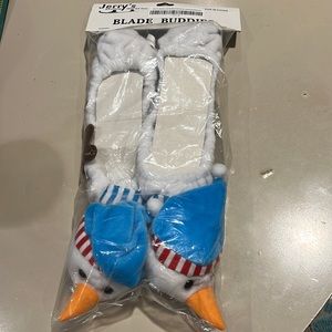 ice skate blade covers snowman Protect blades with these cute animal soakers new